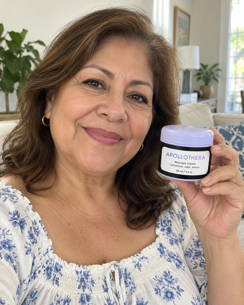 Anita holding ApolloThera Recovery Cream