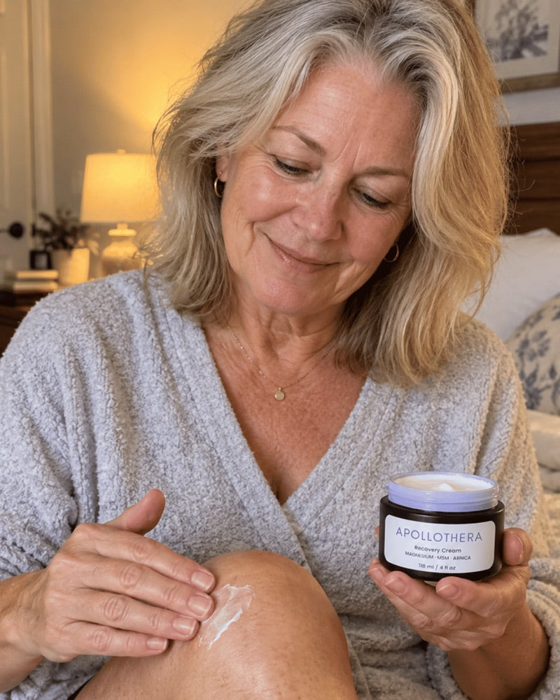 Melissa applying ApolloThera Recovery Cream to her knee