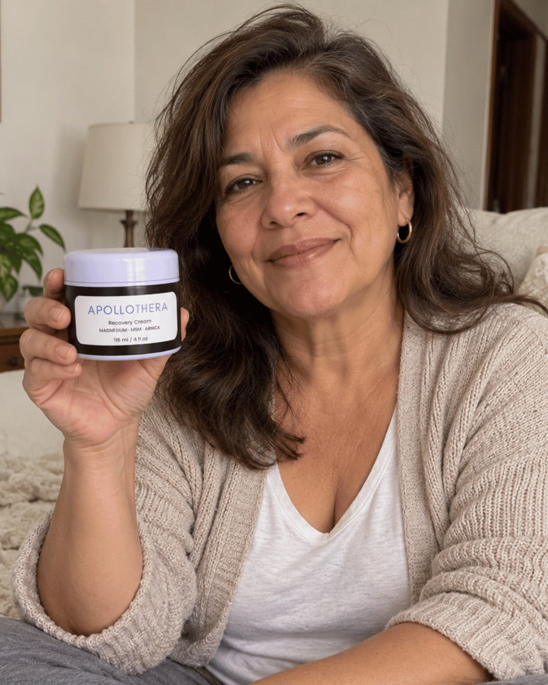 Anita holding ApolloThera Recovery Cream