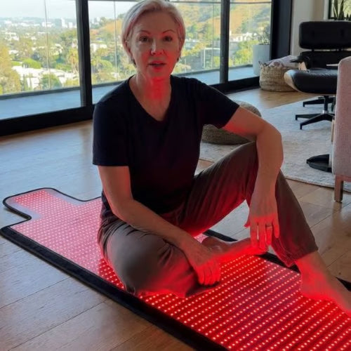 Karen W. using the ApolloThera Full Body Red Light Mat