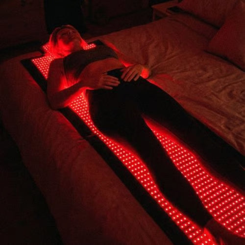 Emma R. using the ApolloThera Full Body Red Light Mat