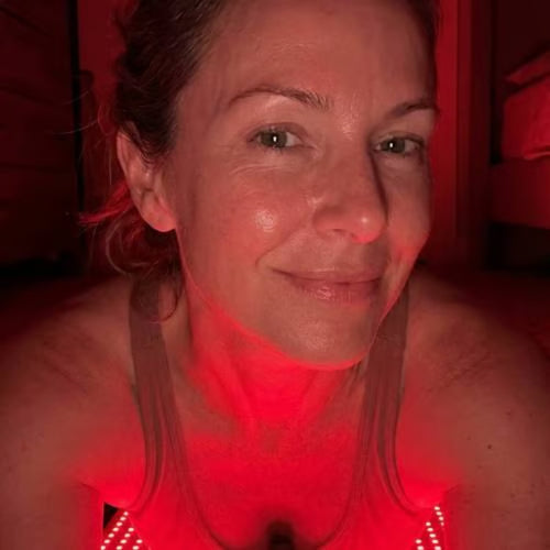 Linda K. using the ApolloThera Full Body Red Light Mat